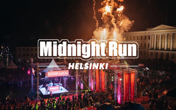 Midnight Run Helsinki löpare i starten och med pyroeld på senatstorget