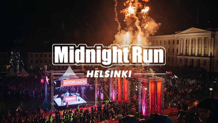 Midnight Run Helsinki löpare i starten och med pyroeld på senatstorget